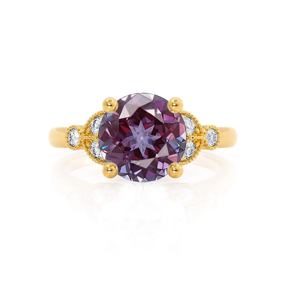 DELILAH - Chatham® Round Alexandrite 18k Yellow Gold Shoulder Set Ring