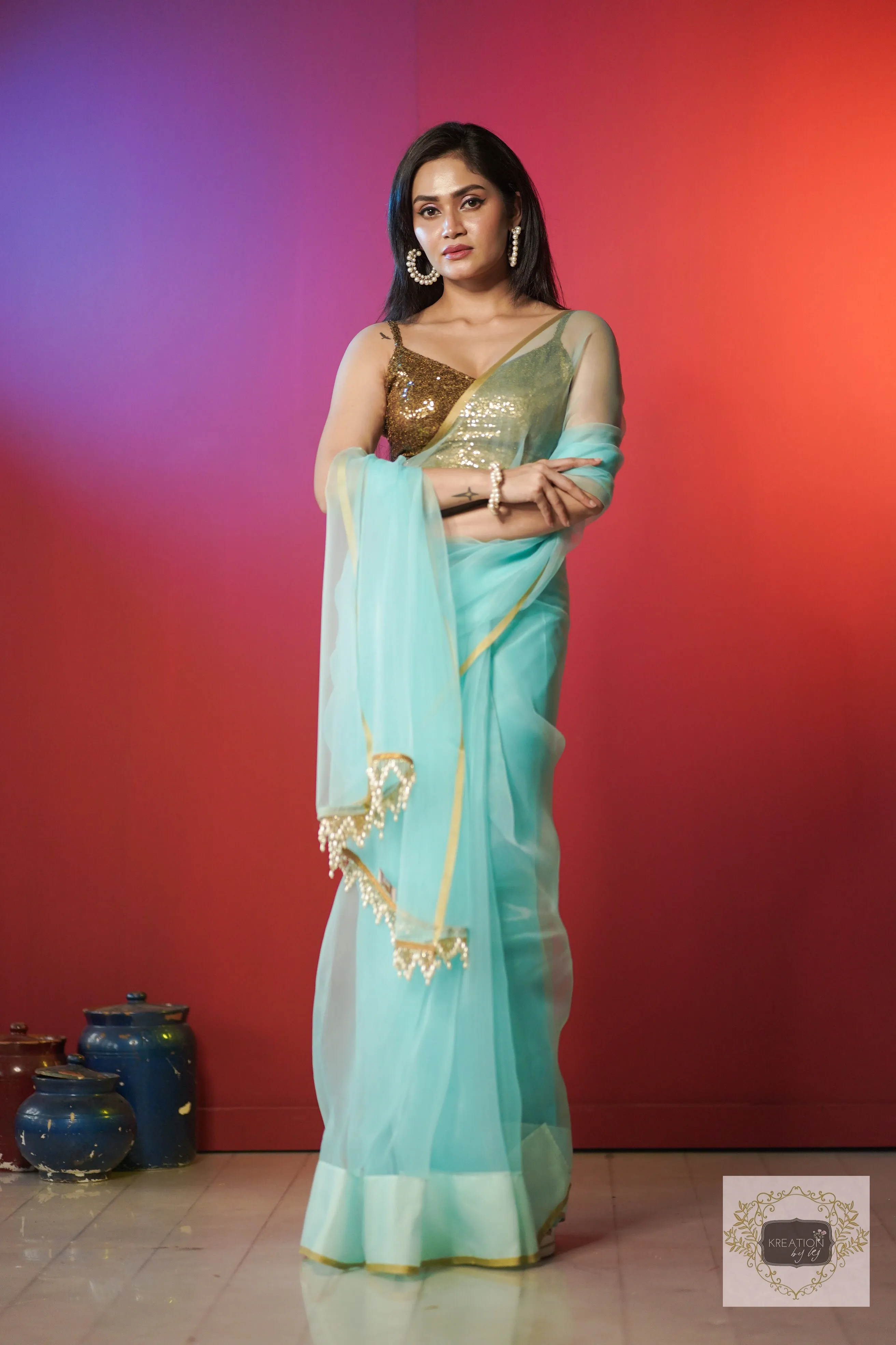 Ice Blue Organza Saree With Handmade Tassels On Pallu